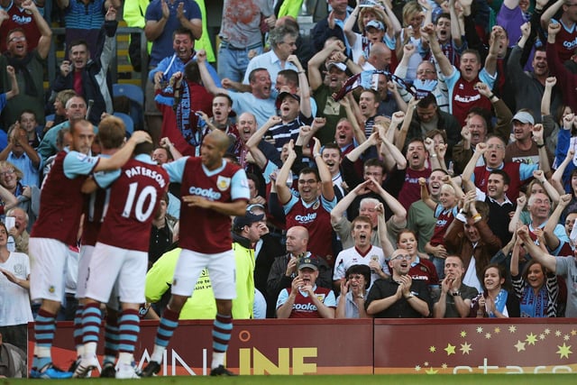 Steven Fletcher, Wade Elliott, Tyrone Mears and Martin Paterson celebrate Burnley's first goal in the Premier League, scored by Robbie Blake at home to Manchester United.