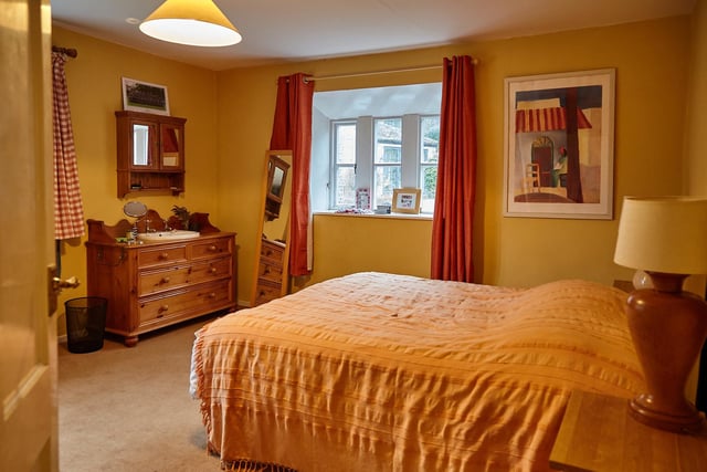 Another of the double bedrooms, with plenty of floor space for free standing furniture.