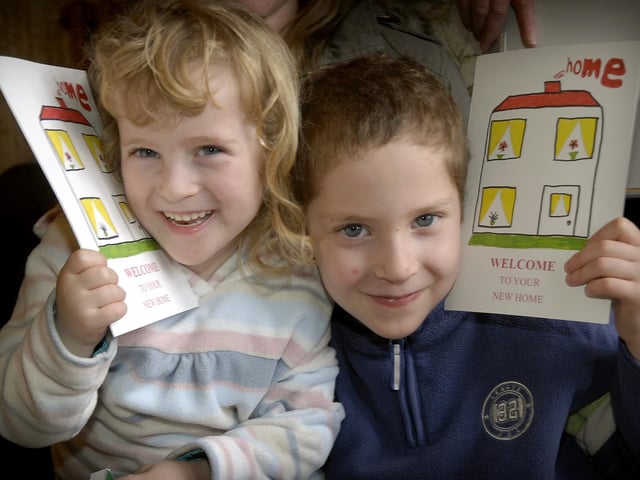 Young artists Leah Kemsley and Kristian Readman with their winning card design.