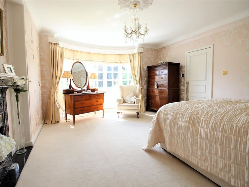 The large bay windows are a feature of the property