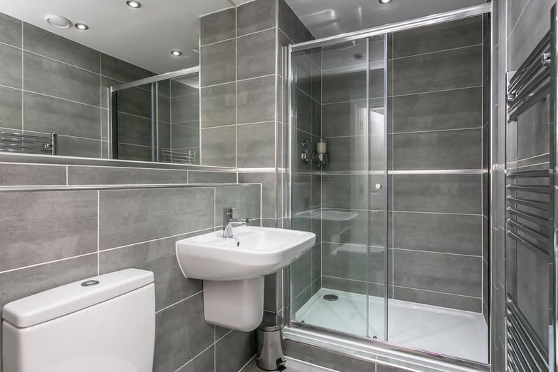 The Tower at The Residence in Lancaster. One of the ensuite bathrooms with a walk in rain shower and fitted bath.