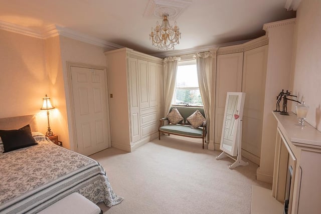 One of the luxurious double bedrooms, with fitted furniture.