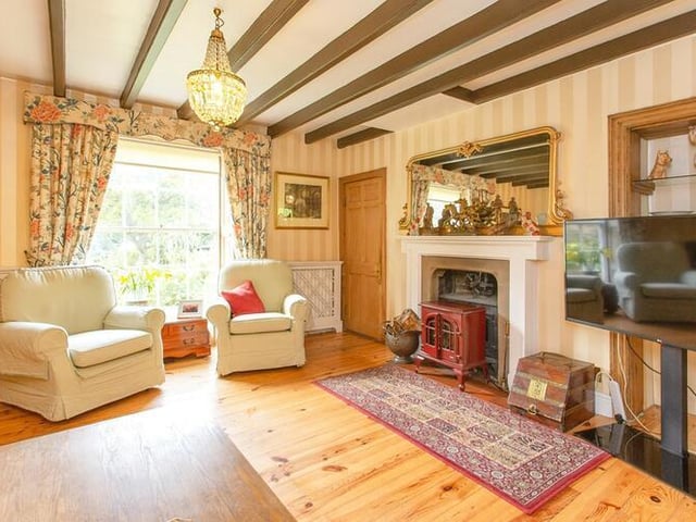 Large windows allow natural light to flood rooms within the house.