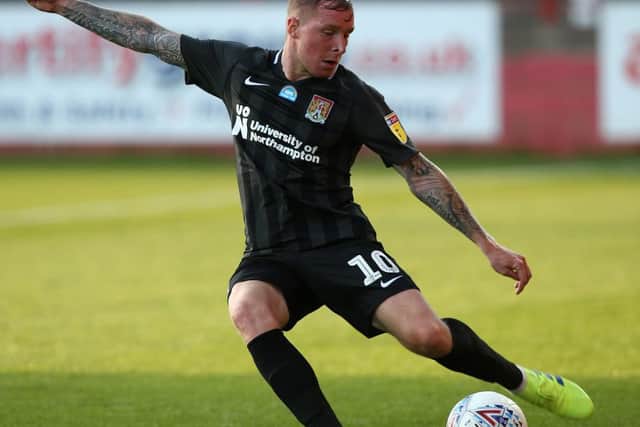Nicky Adams' superb cross set up the opening goal against Cheltenham on Monday.