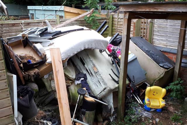 The pile of rubbish in a garden in Cecil Road, Kingsthorpe, Northampton