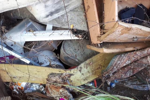 All sorts of rubbish is in the pile