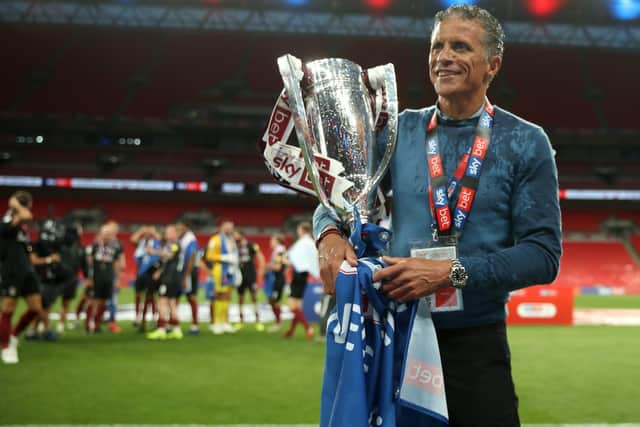 Cobblers boss Keith Curle was able to savour promotion at Wembley Stadium