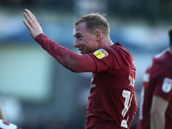 Nicky Adams waves goodbye to League Two.