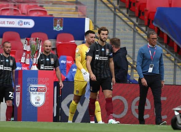 Keith Curle leads out the Cobblers at Wembley.