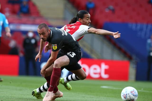 Michael Harriman enjoyed an excellent game against Exeter's Randell Williams at Wembley on Monday