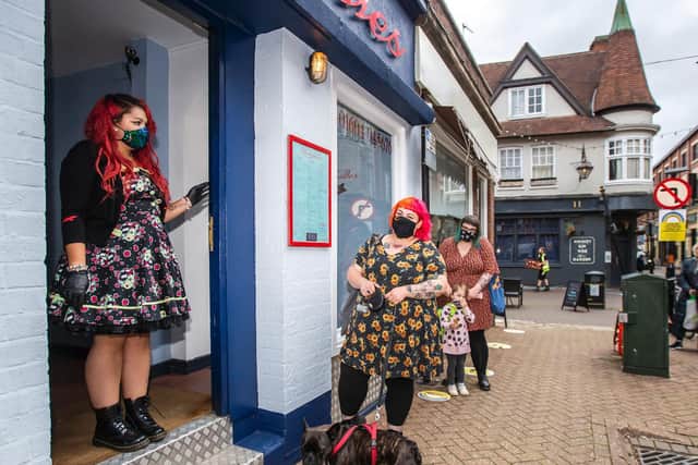 Staff were letting one customer in at a time to get comfy at the Dychurch Lane salon to get comfy.