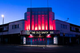 The Old Savoy lit up red for the Light It Up Red campaign. Photo: Leila Coker