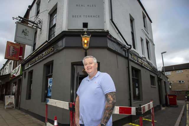 The Gardener's Arms landlord Paul Earwaker opened his pub on Wellingborough Road at 11am on Saturday. Pictures by Kirsty Edmonds.
