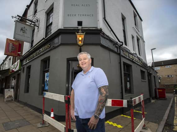 The Gardener's Arms landlord Paul Earwaker opened his pub on Wellingborough Road at 11am on Saturday. Pictures by Kirsty Edmonds.