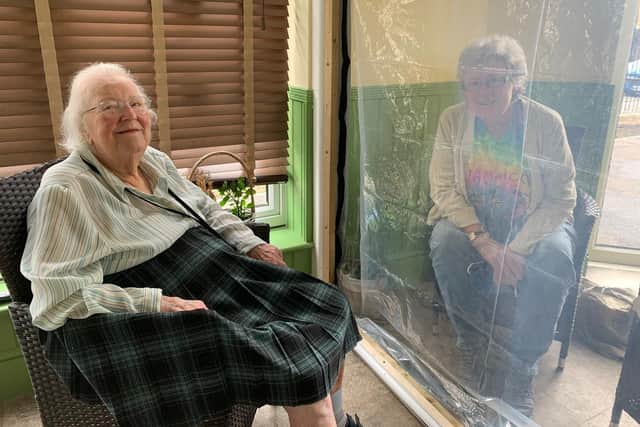 The social distancing room is allowing residents to reunite with loved ones.