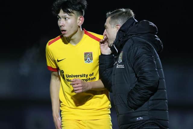 Jacob Ballinger with U18s coach Jon Brady.