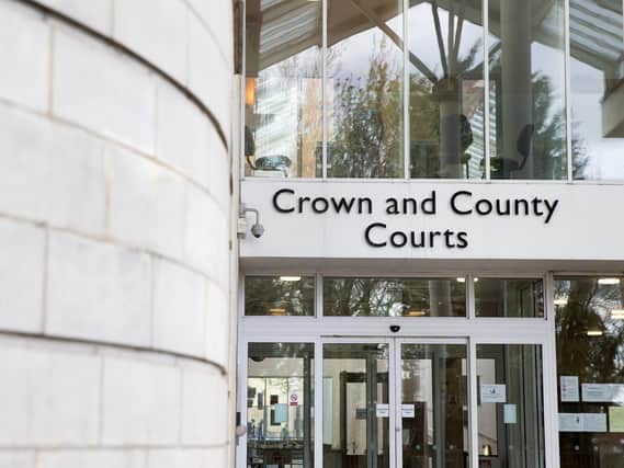 Christopher Hulland appeared at Northampton Crown Court yesterday charged with assault by beating and damaging property.