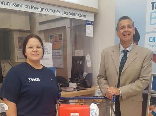 Nick Tite, with a recent donation from Tesco for refreshments at Mind's Crisis Cafes.