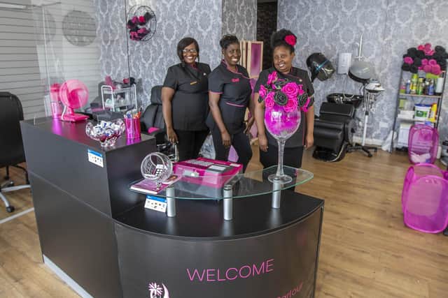 Flowey Beauty Parlour owners Rutendo Nyatsine (centre) and Florence Nyatsine (right) with member of staff Belinda Fumai