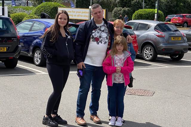 (L-R) Eve, Rob, Kim and Fae Scholefield outside Allen Ford at Riverside Retail Park. Photo: Simply Mustangs UK
