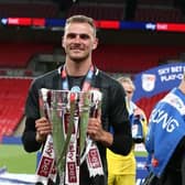 Harry Smith with the League Two play-off trophy.