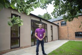 Northampton Borough Councillor for Rectory Farm James Hill standing proud outside the community centre after works have been completed. Pictures by Kirsty Edmonds.