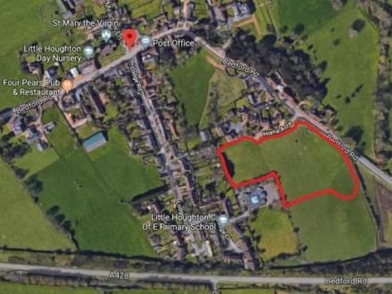 The application site is next to the primary school in Little Houghton.