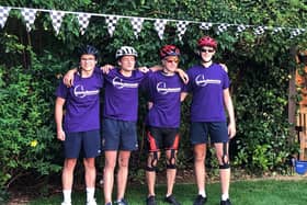 (L-R) Dom Pritchard, Luca Cinquini-Steel, Ethan Laporta and Dino Gallone pose for a photo after completing their cycling challenge