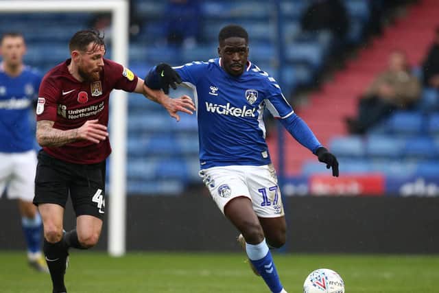 Christopher Missilou in action for Oldham against the Cobblers in November's 2-2 draw at Boundary Park