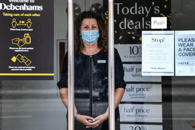 Face coverings have been required in stores since last Friday although staff are not forced to wear them. Photo Getty Images
