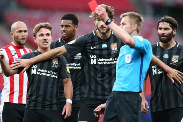 Dean Moxey sees red during the League Two play-off final.
