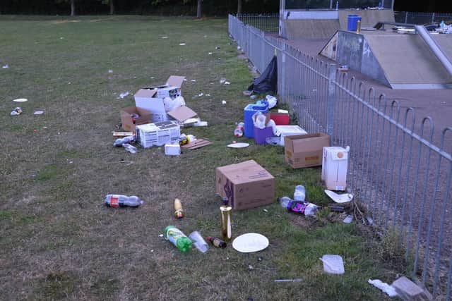 Alcohol boxes, takeaway containers and plastic drinks bottles were left strewn across the grass.