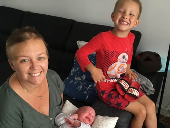 Monika pictured with her children, Alexander and baby Eliana