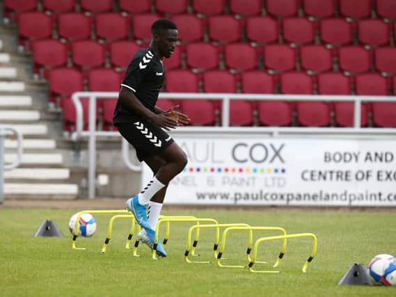 New signing Christopher Missilou is put through his paces on the first day of pre-season training.
