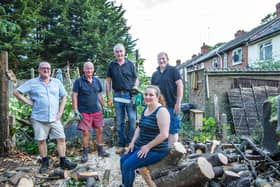 Teresa with her team from the newly set-up McCarthy Dixon Foundation pictured after six hours of tree cutting on Thursday night in Tracey's garden. Pictures by Kirsty Edmonds.