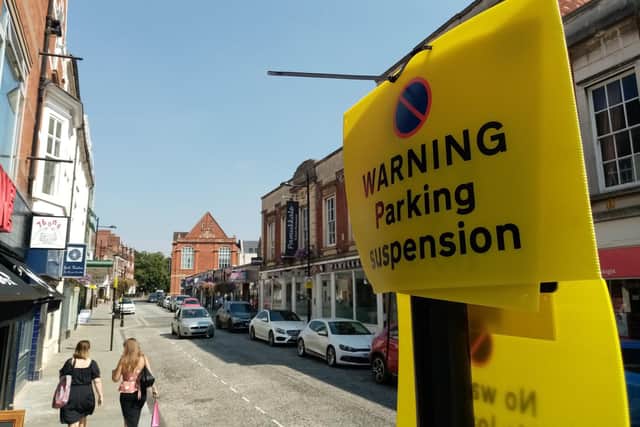 The parking spaces on the north side of St Giles Street have been temporarily made inaccessible.