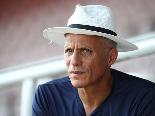 Keith Curle's famous hat has been needed as Cobblers train in the blistering heat.