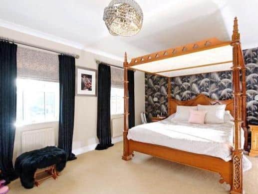The master bedroom has an en suite wet room, and a dressing room with floor to ceiling wardrobes. There are three further double bedrooms, on the first floor, two with en suite shower rooms and fitted wardrobes. The family bathroom has a steam shower and Jacuzzi style bath. The remaining bedroom is on the second floor and has fitted wardrobes, study and sitting areas and an en suite shower room.