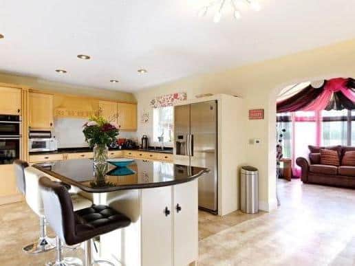 The property has been extended and now has 4,272 sq ft. of accommodation including the annexe which is above the garage. The triple aspect sitting room has an open fireplace and views across the golf course. The kitchen/breakfast room is open plan to the dining room and conservatory.