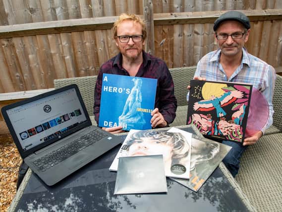 Simon Starkey and Mark Thorneycroft with some of the records Spinadisc is stocking online.
