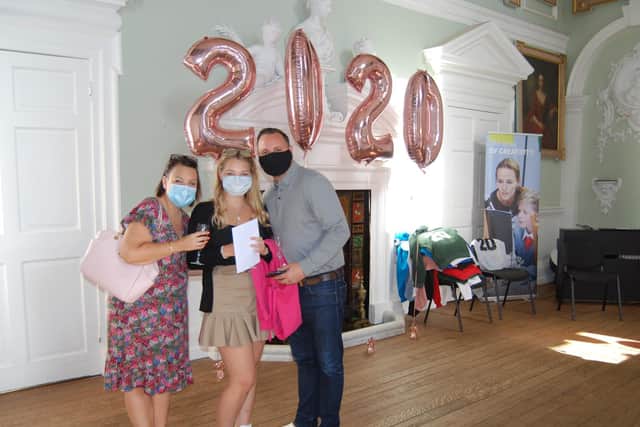 A happy Quinton House School student with her family after getting her GCSE results