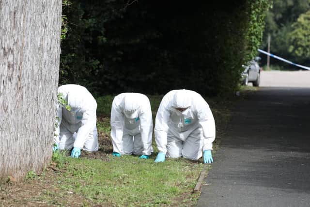 Police at the scene yesterday.