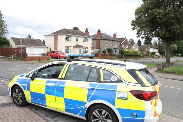 Police at the scene yesterday.