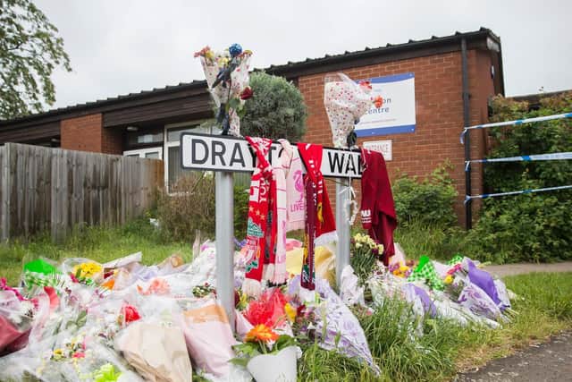 A tribute to Louis at the entrance to Drayton Walk where he was stabbed and killed.