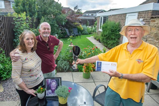 Joint winners Anne and James Moore with Richard Drone (right). Photo: Kirsty Edmonds.