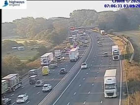 Queues building on the M1 at around 7am following an accident which closed two lanes