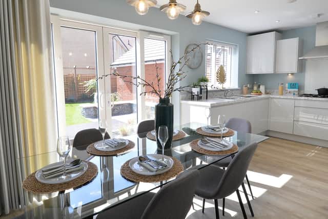 The three and four-bedroom homes have an open-plan kitchen and dining room.