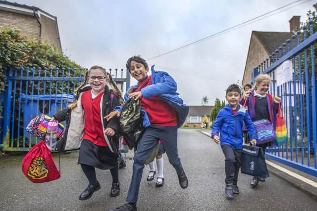 It was return of the red jumpers today as some pupils got to wear their school uniforms for the first time since March. Pictures by Kirsty Edmonds.