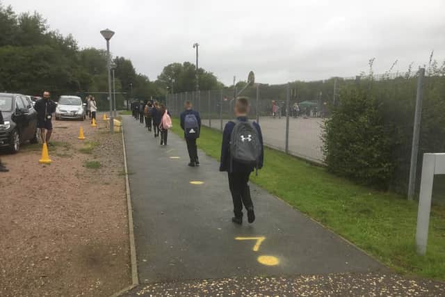 Social distancing measures are firmly in place, outside and inside the school.