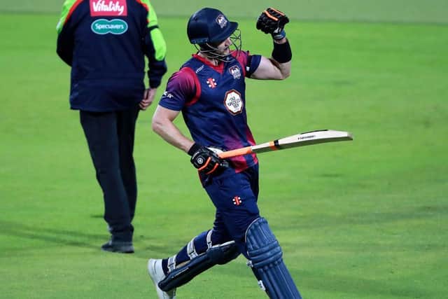 Alex Wakely celebrates after scoring the winnings runs